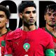 A graphic featuring three Morocco national football team players in red Puma jerseys with green trim: Eliesse Ben Seghir wearing number 14 on the left, captain Achraf Hakimi in the center wearing an armband, and Brahim Díaz on the right pointing to his crest, all set against a white background with the bold black text "SCARY." Image used for Sportxparte news.