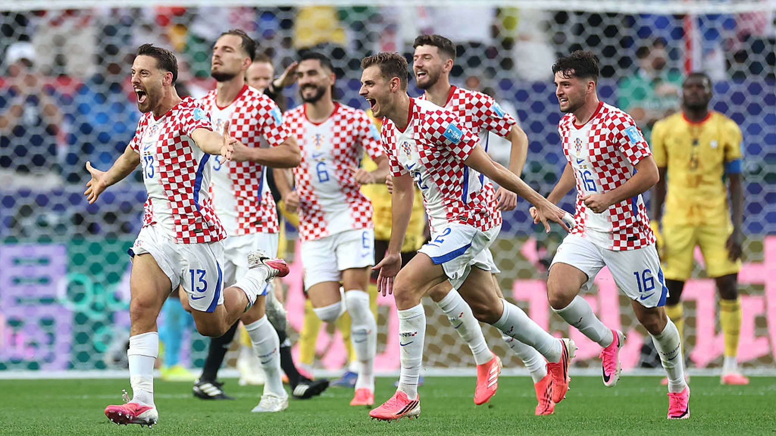 The Croatia national football team is celebrating Nikola Vlašić's game-winning goal against Ghana during the FIFA World Cup 2026. Image used for Sportxparte news.