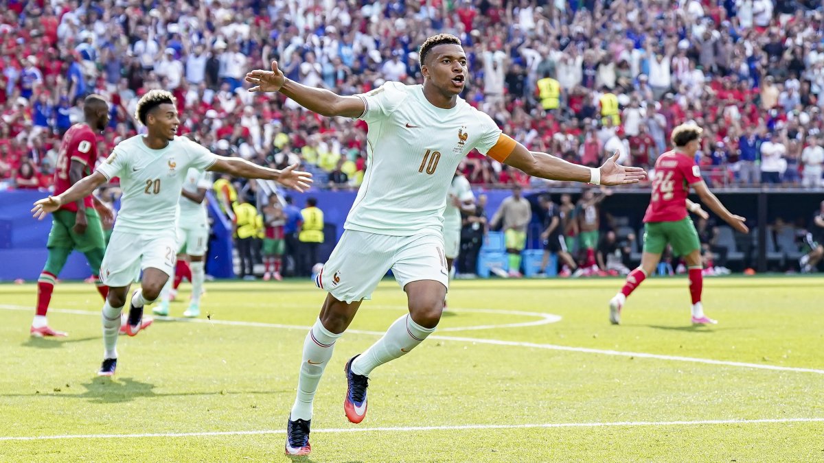 French captain Kylian Mbappé celebrates his opening goal on the hour mark at Boston Stadium. Mbappé broke the scoreless deadlock in the 60th minute with a curling strike into the far corner, redeeming a missed penalty from the first half. Image used for Sportxparte news.