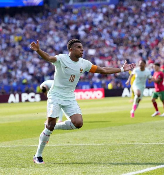 Kylian Mbappé is celebrating a goal for France against Morocco during the FIFA World Cup 2026 quarterfinal match. Image used for Sportxparte news.