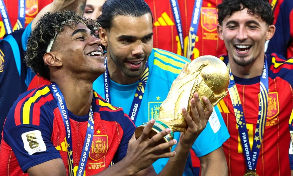 Spanish forward Lamine Yamal celebrates alongside teammates like goalkeeper David Raya after defeating Argentina 1-0 in extra time during the tournament final at MetLife Stadium on July 19, 2026. Image used for Sportxparte news.