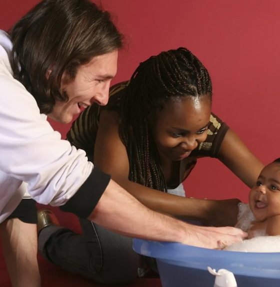 20-year-old Lionel Messi helping to bathe a six-month-old baby who grew up to be Spanish football sensation Lamine Yamal. The woman in the photo next to them is Yamal's mother, Sheila Ebana. Image used for Sportxparte news.