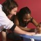 20-year-old Lionel Messi helping to bathe a six-month-old baby who grew up to be Spanish football sensation Lamine Yamal. The woman in the photo next to them is Yamal's mother, Sheila Ebana. Image used for Sportxparte news.
