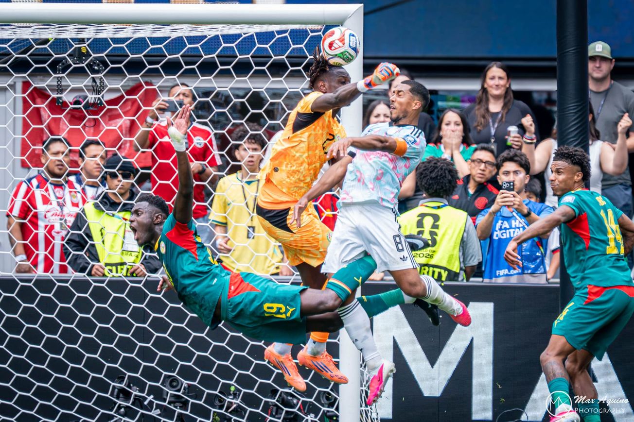 Dramatic aerial goalpost collision between Belgium and Senegal football players at Seattle Stadium during the 2026 World Cup knockout stage. Image used for Sportxparte news.