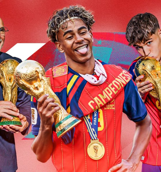 A celebratory sports graphic featuring Spain's national football team after winning the 2026 FIFA World Cup, with manager Luis de la Fuente, forward Lamine Yamal sticking out his tongue, and defender Pau Cubarsí kissing the FIFA World Cup trophy, all wearing gold champion medals over their red and blue national jerseys against a vibrant red background. Image used for Sportxparte news.