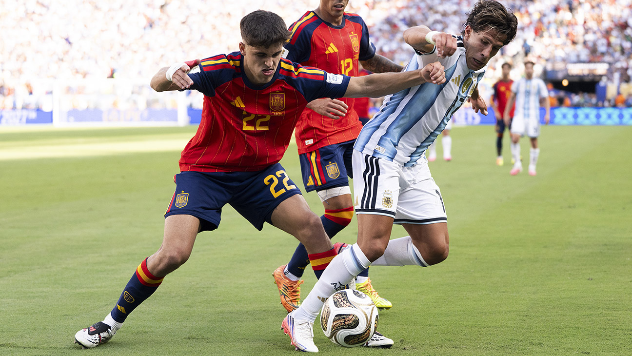 Spain defender Pau Cubarsí battling Argentina for possession during the 2026 FIFA World Cup Final match. Image used for Sportxparte news.