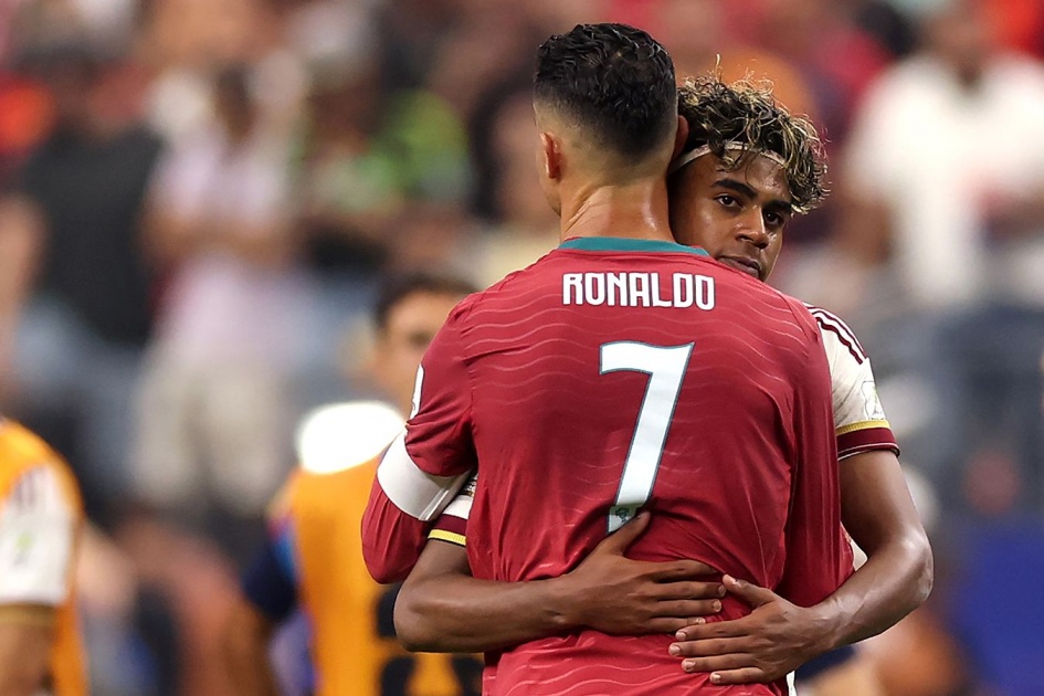 Spain’s Lamine Yamal is hugging Portugal’s Cristiano Ronaldo following Spain's 1-0 victory over Portugal in the Round of 16 at the 2026 FIFA World Cup. Image used for Sportxparte news.