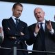 Gianni Infantino, the President of FIFA, speaking while Aleksander Čeferin, the President of UEFA, looks on with his arms crossed. Image used for Sportxparte news.