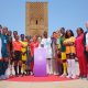 Female football players from various national teams posing with the new TotalEnergies CAF Women's Africa Cup of Nations trophy at the Hassan Tower in Rabat, Morocco. Image used for Sportxparte news.