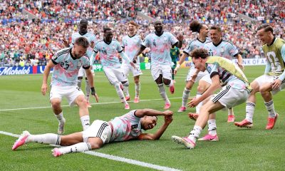 Belgium's Youri Tielemans celebrates with teammates after scoring a crucial goal against Senegal during the 2026 FIFA World Cup Round of 32 match. Image used for Sportxparte news.