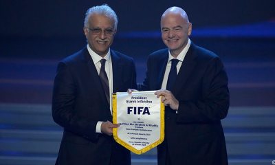 FIFA President Gianni Infantino and AFC President Sheikh Salman bin Ebrahim Al Khalifa holding a commemorative FIFA pennant banner at the AFC Annual Awards ceremony in Seoul. Image used for Sportxparte news.
