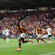 Newly promoted Hull City secured a stunning 2-0 victory over Manchester United at the MKM Stadium in their opening Premier League match on August 22, 2026. First-half goals from centre-backs Semi Ajayi and debutant Nobel Mendy shocked Michael Carrick's side and gave the Tigers a dream start to the season. Image used for Sportxparte news.