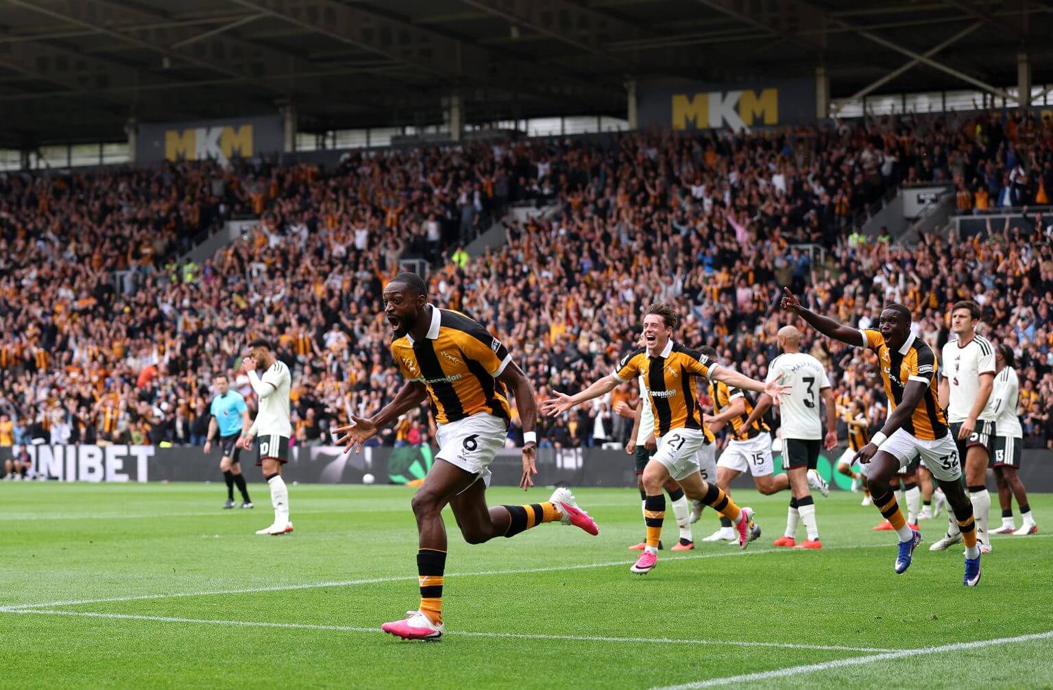 Newly promoted Hull City secured a stunning 2-0 victory over Manchester United at the MKM Stadium in their opening Premier League match on August 22, 2026. First-half goals from centre-backs Semi Ajayi and debutant Nobel Mendy shocked Michael Carrick's side and gave the Tigers a dream start to the season. Image used for Sportxparte news.