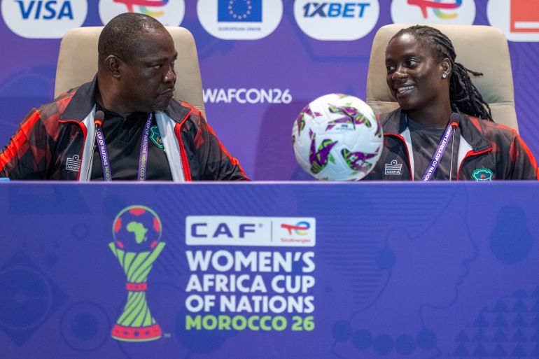 Malawi national women's football team head coach Lovemore Fazili, alongside star forward Tabitha Chawinga, is attending an official press conference. The duo is representing the "Scorchers" during the 2026 Women's Africa Cup of Nations (WAFCON) hosted in Morocco. Image used for Sportxparte news.