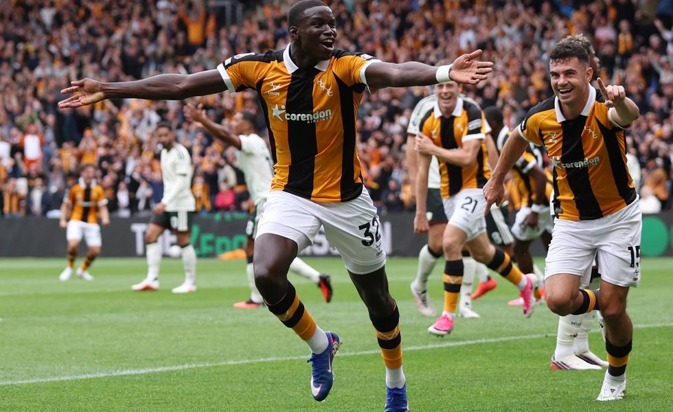 Newly promoted Hull City achieved a historic 2-0 victory over Manchester United in their Premier League opening match at the MKM Stadium on August 22, 2026. First-half goals from Semi Ajayi and Nobel Mendy sealed the shock win. Image used for Sportxparte news.