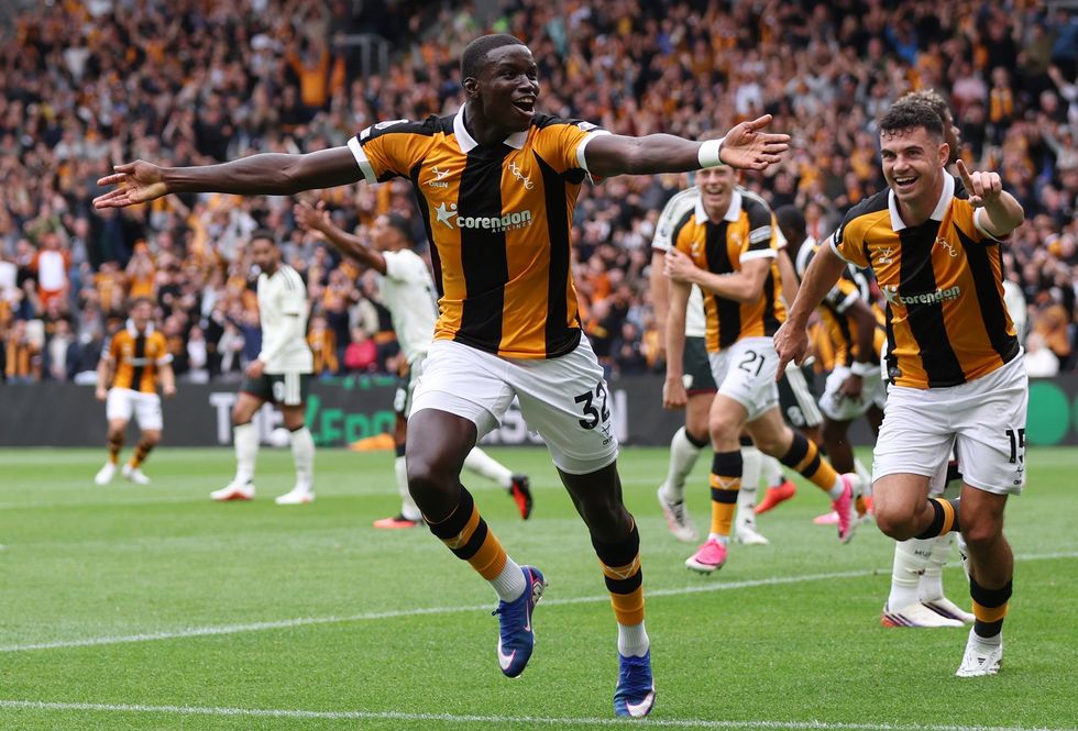 Newly promoted Hull City achieved a historic 2-0 victory over Manchester United in their Premier League opening match at the MKM Stadium on August 22, 2026. First-half goals from Semi Ajayi and Nobel Mendy sealed the shock win. Image used for Sportxparte news.