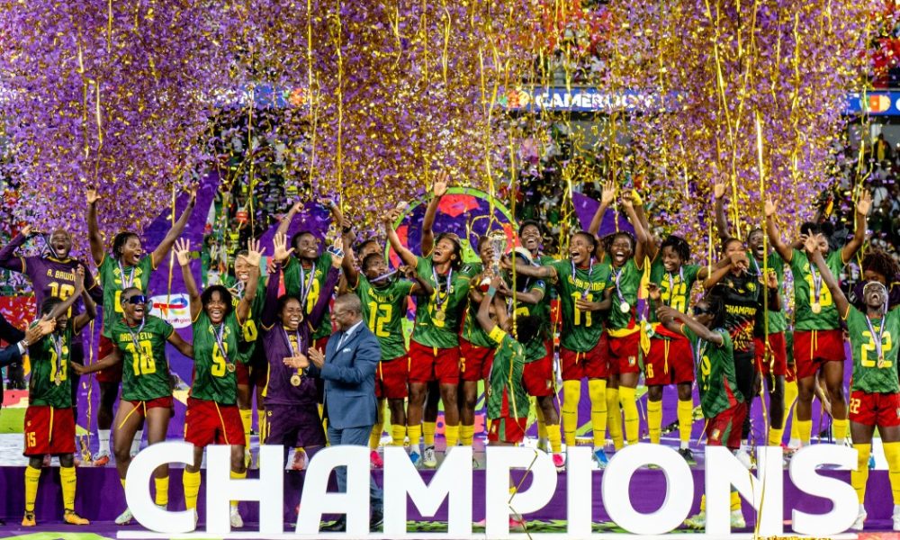 Cameroon's women's national football team (the Indomitable Lionesses) celebrates winning their historic first-ever Women's Africa Cup of Nations (WAFCON) title. They defeated Malawi 3-0 in the final held on August 16, 2026, in Rabat, Morocco. Image used for Sportxparte news.
