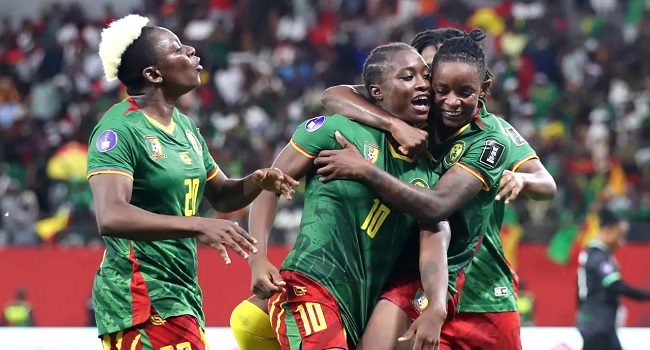 Cameroon women’s national football team players in green and red jerseys celebrating their historic 3-0 victory against Malawi in the 2026 WAFCON final match. Image used for Sportxparte news.