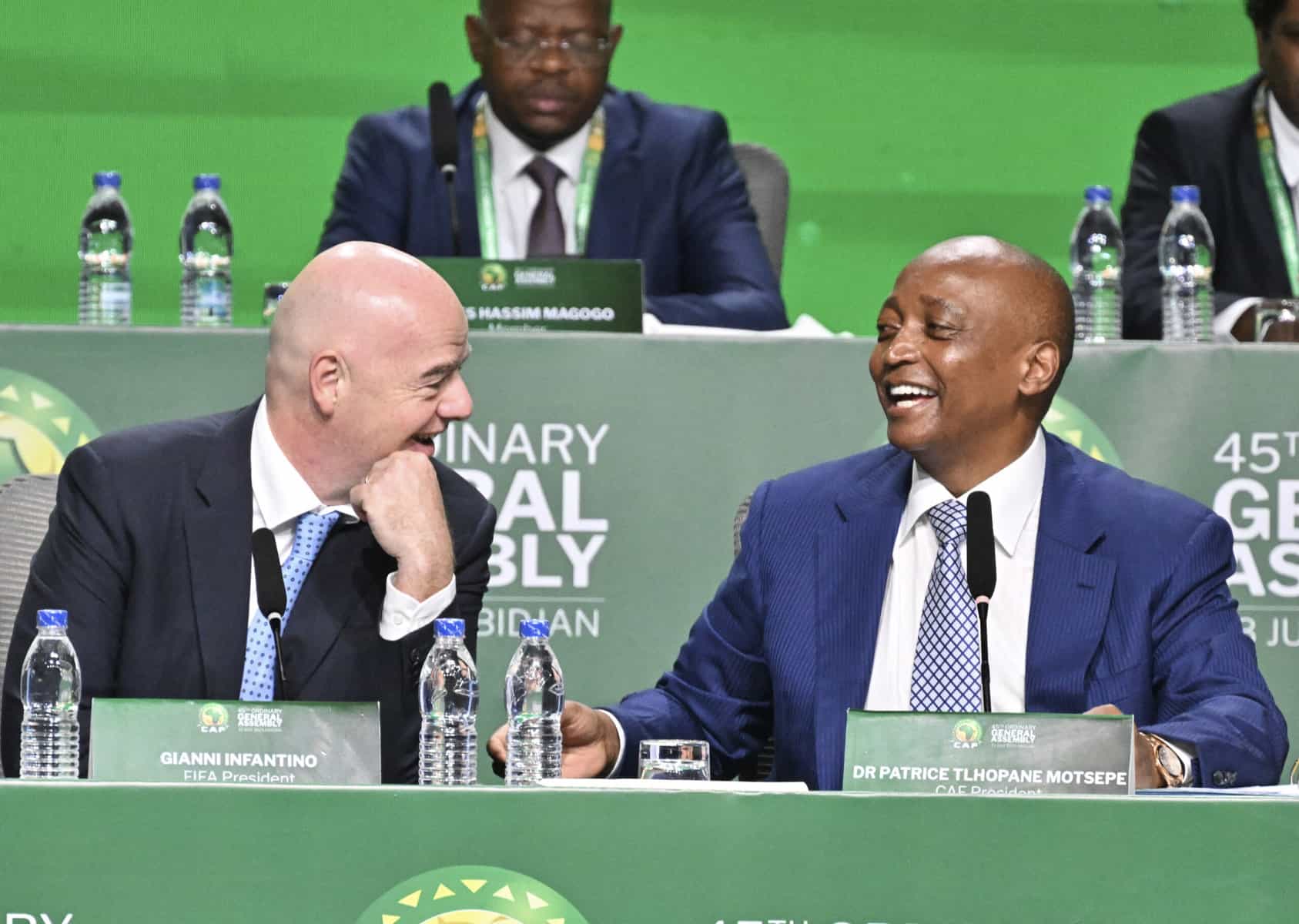 FIFA President Gianni Infantino and CAF President Dr. Patrice Motsepe laughing together during the 45th Ordinary General Assembly of the Confederation of African Football (CAF) in Abidjan, Ivory Coast. Image used for Sportxparte news.