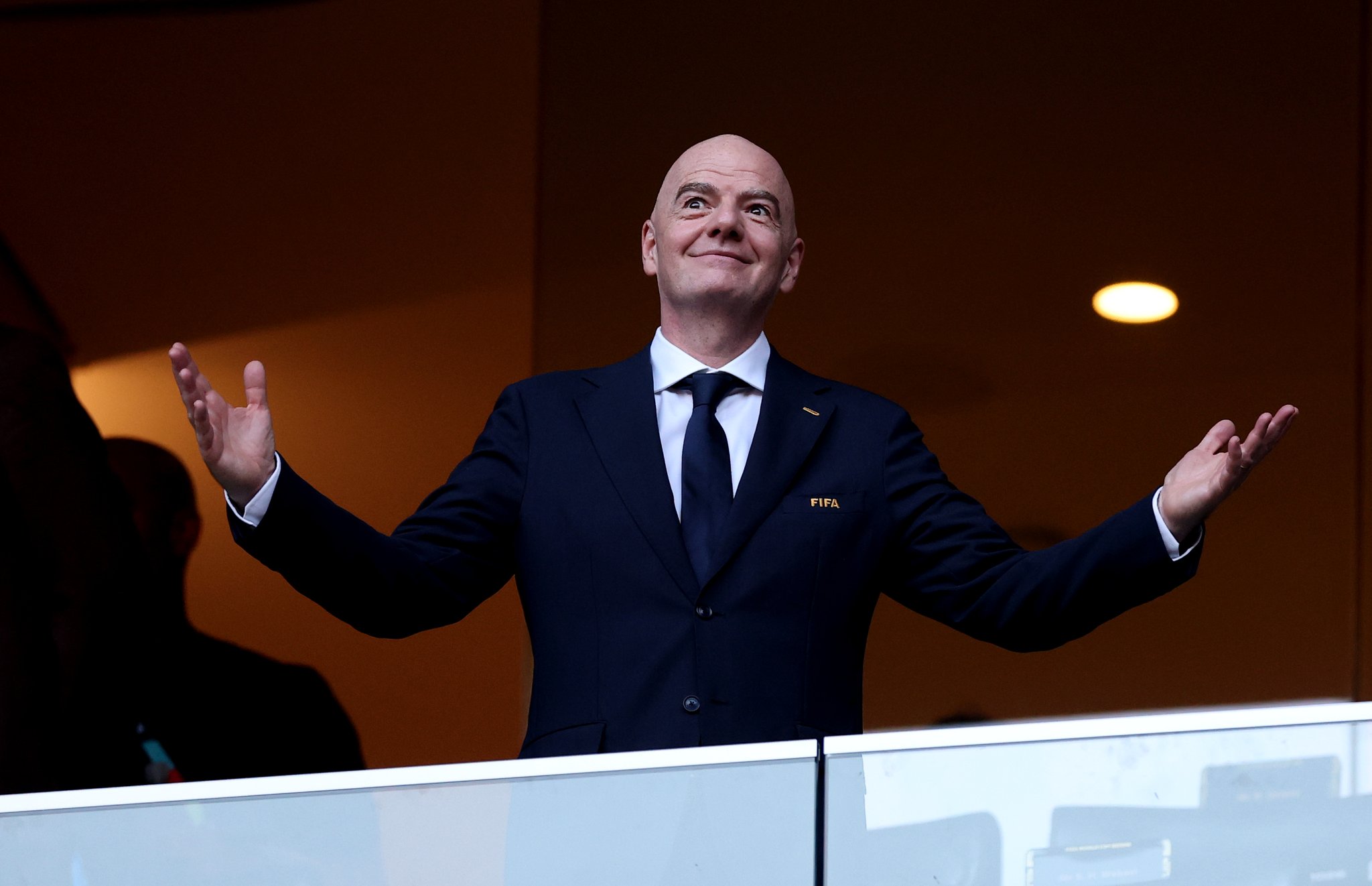 FIFA President Gianni Infantino reacting from the executive seating area during a football tournament match. Image used for Sportxparte news.