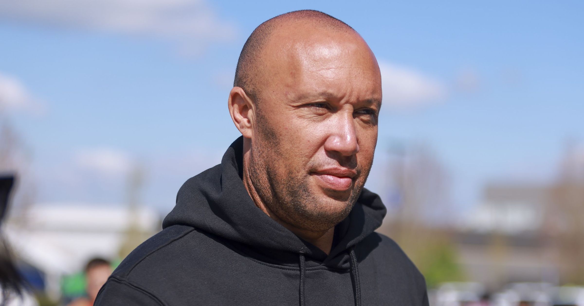Former French professional footballer and Manchester United defender Mikaël Silvestre wearing a black hooded sweatshirt. Image used for Sportxparte news.