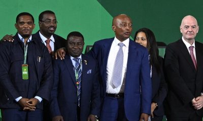 African and global football leadership, including Samuel Eto'o (far left), CAF President Patrice Motsepe (center in the blue suit), and FIFA President Gianni Infantino (far right). Image used for Sportxparte news.